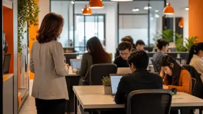 hr manager mengamati karyawan gen z yang sibuk bekerja sebagai ilustrasi dampak hustle culture pada psikologi kerja
