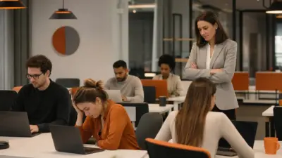 seorang hr leader memantau tim di kantor modern untuk menjaga wellbeing kerja di tengah budaya hustle